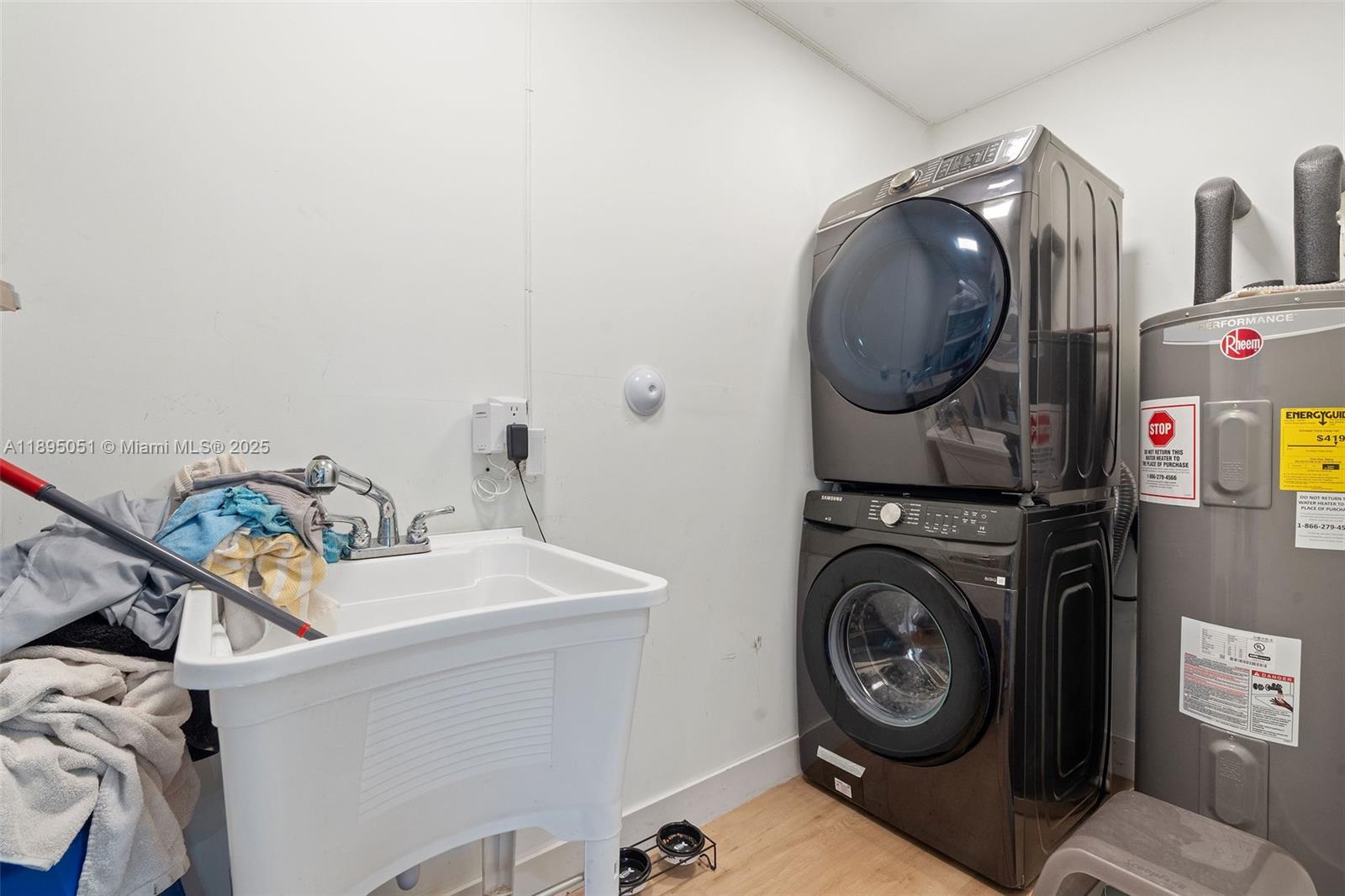 8121 Southwest 97th Terrace Miami, FL 33156 - Photo 38 of 38 a utility room with dryer and washer