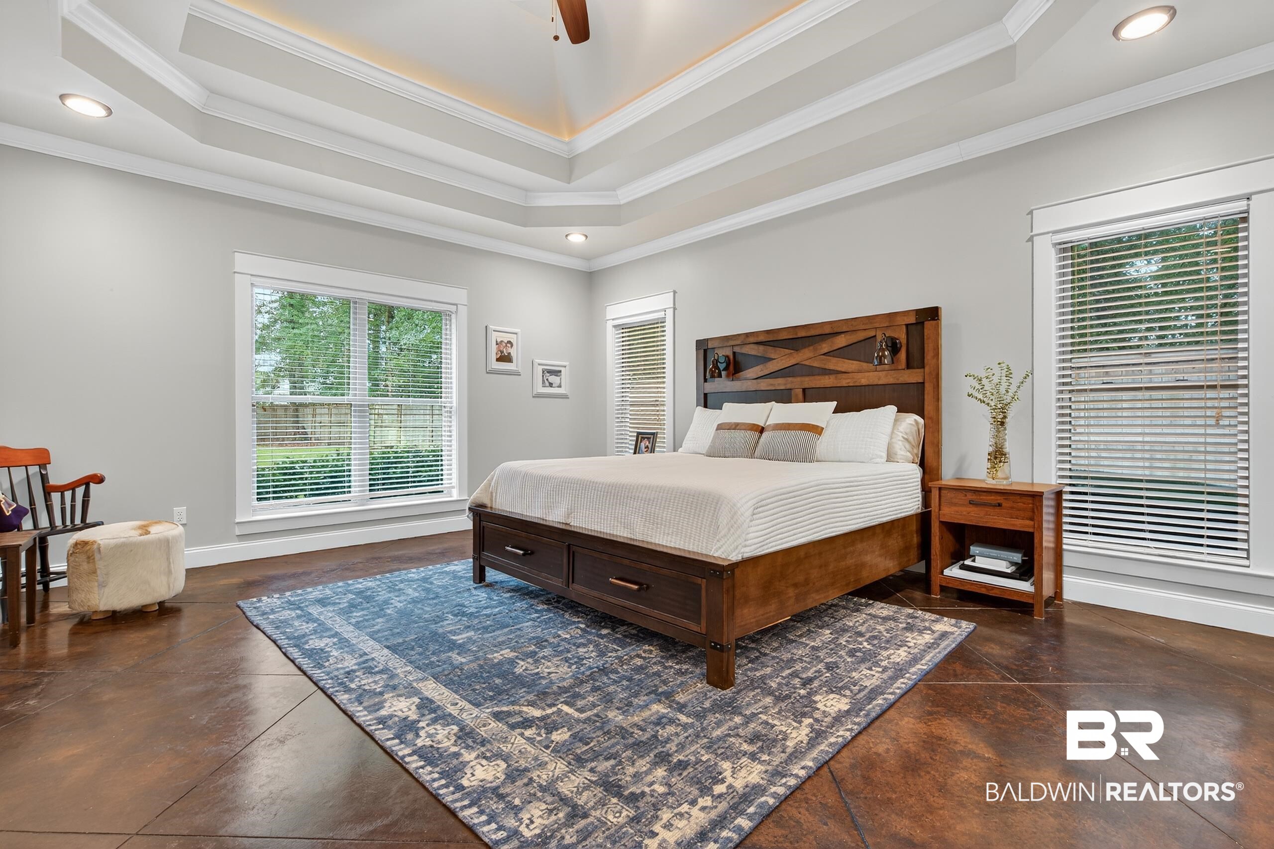 5517 Rabbit Creek Drive Theodore, AL 36582 - Photo 13 of 33 Bedroom with recessed lighting, concrete flooring, a raised ceiling, ornamental molding, and a ceiling fan