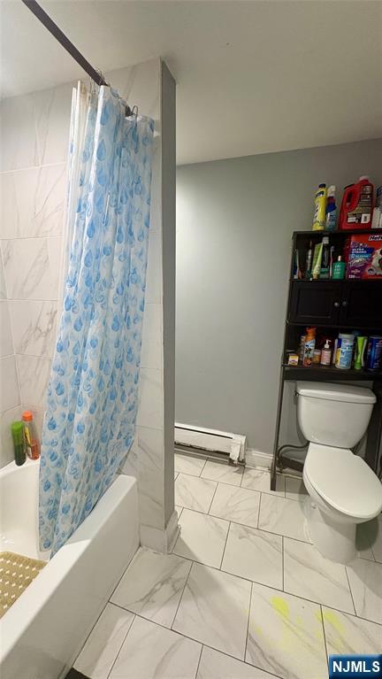 17 Cleveland Avenue, Unit 2 Harrison, NJ 07029 - Photo 12 of 12 a bathroom with a bathtub and a toilet