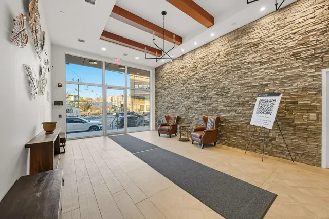a bathroom with sink mirror and bathtub