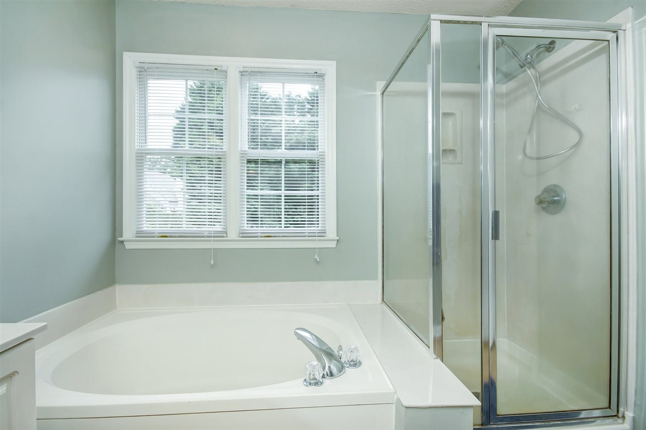 5300 Halcott Court Raleigh, NC 27613 - Photo 16 of 23 Great soaking tub! Catch up on a great book after a hard day of work or play! Owner's Suite