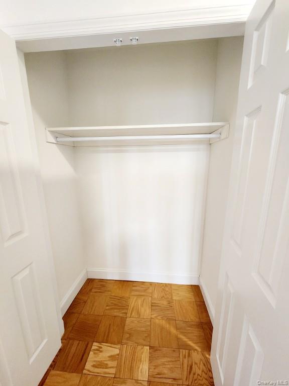 61-20 Grand Central Parkway, Unit A1406 Queens, NY 11375 - Photo 11 of 23 a view of a room with an empty space