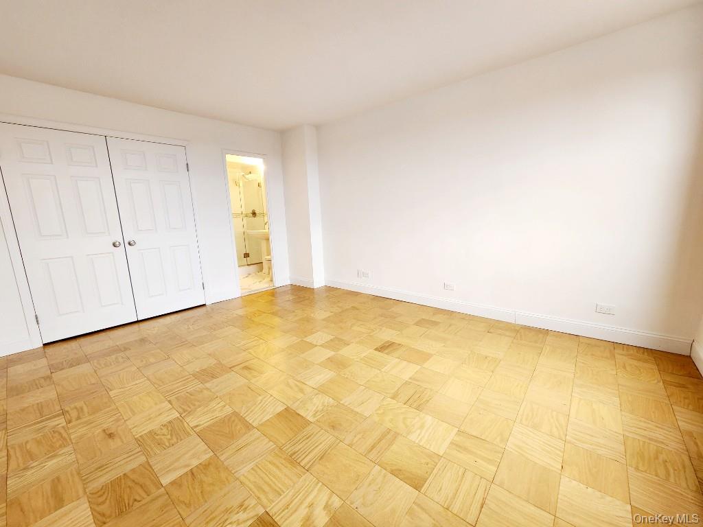 61-20 Grand Central Parkway, Unit A1406 Queens, NY 11375 - Photo 13 of 23 a view of empty room