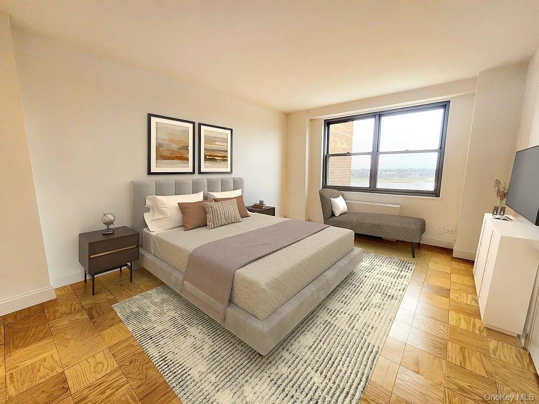 61-20 Grand Central Parkway, Unit A1406 Queens, NY 11375 - Photo 16 of 23 a bedroom with a bed wooden floor and a large window