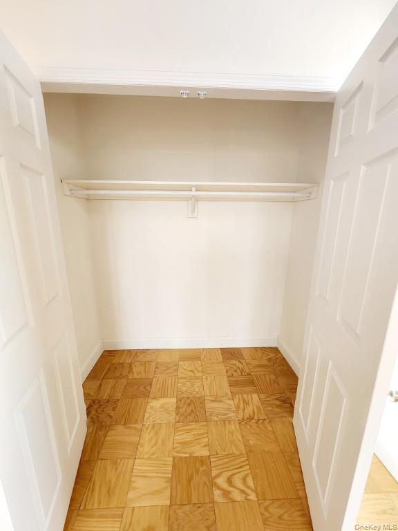 61-20 Grand Central Parkway, Unit A1406 Queens, NY 11375 - Photo 20 of 23 a view of a room with a bathtub