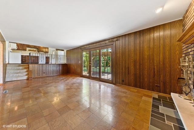 560 North Rohlwing Road Palatine, IL 60074 - Photo 14 of 25 a view of an empty room with a window