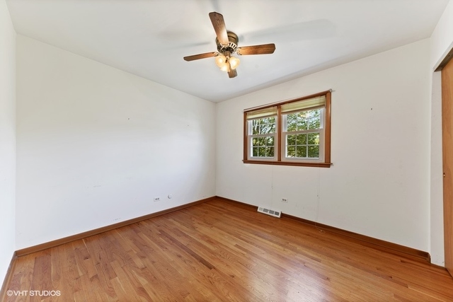 560 North Rohlwing Road Palatine, IL 60074 - Photo 19 of 25 a view of empty room with wooden floor