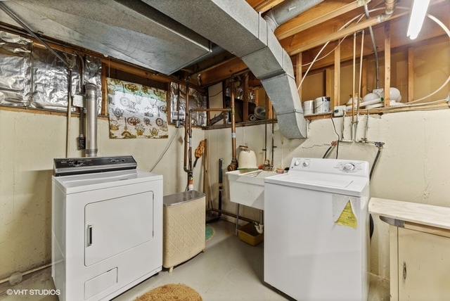560 North Rohlwing Road Palatine, IL 60074 - Photo 22 of 25 a utility room with dryer and washer