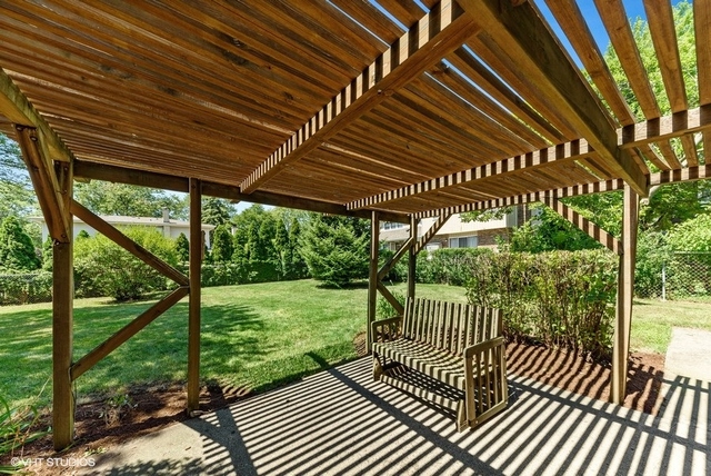 560 North Rohlwing Road Palatine, IL 60074 - Photo 23 of 25 a view of a porch with a yard