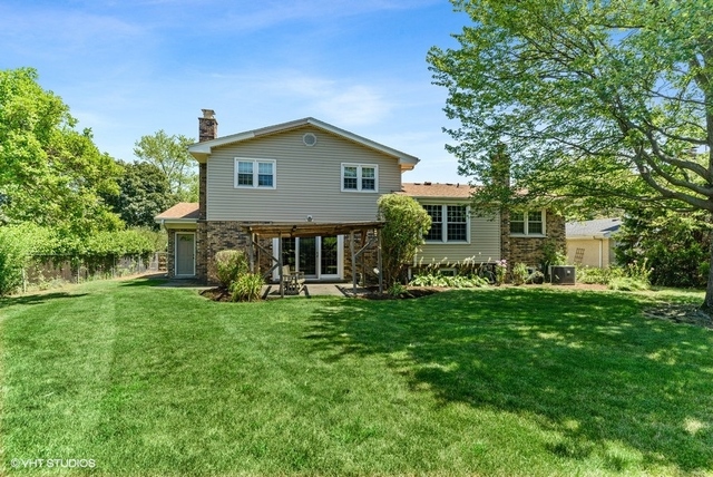 560 North Rohlwing Road Palatine, IL 60074 - Photo 24 of 25 a view of a house with a yard