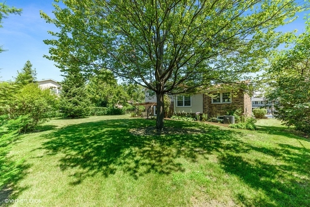 560 North Rohlwing Road Palatine, IL 60074 - Photo 25 of 25 a view of a house with a yard