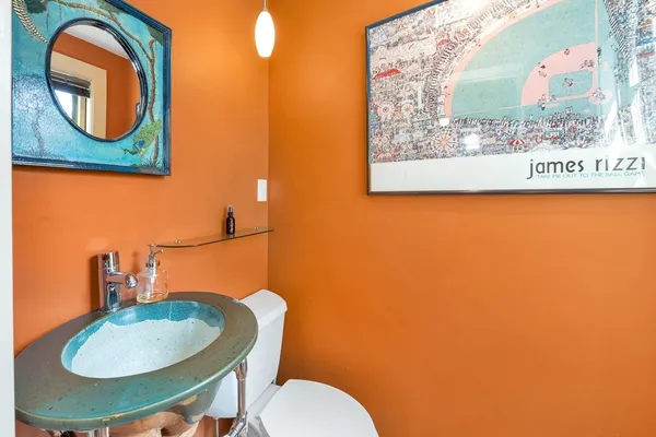 a bathroom with a toilet and a sink