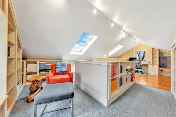 a room with furniture and gym equipment