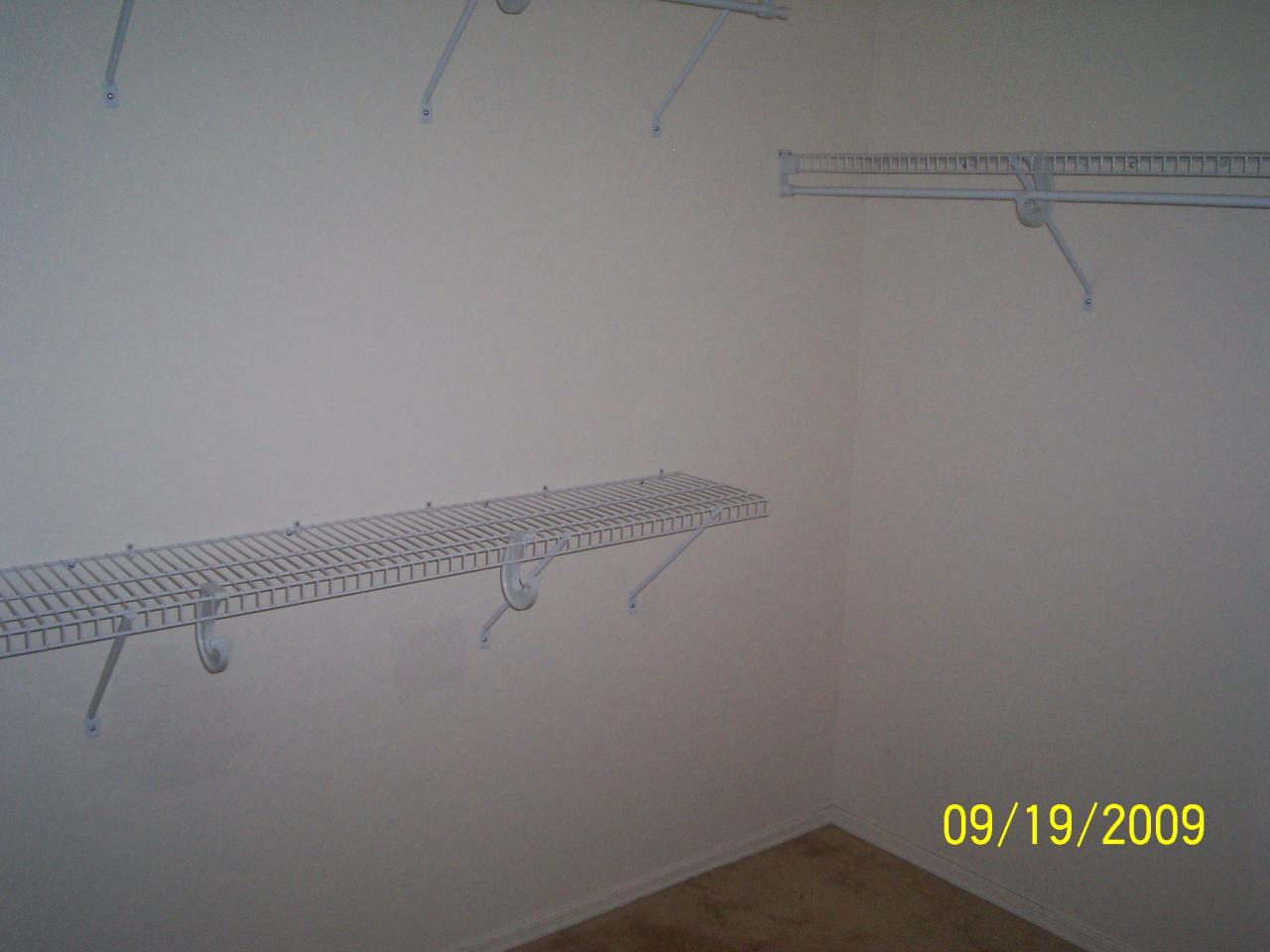 12746 West Boca Raton Road El Mirage, AZ 85335 - Photo 17 of 23 Master bedroom walk-in closet