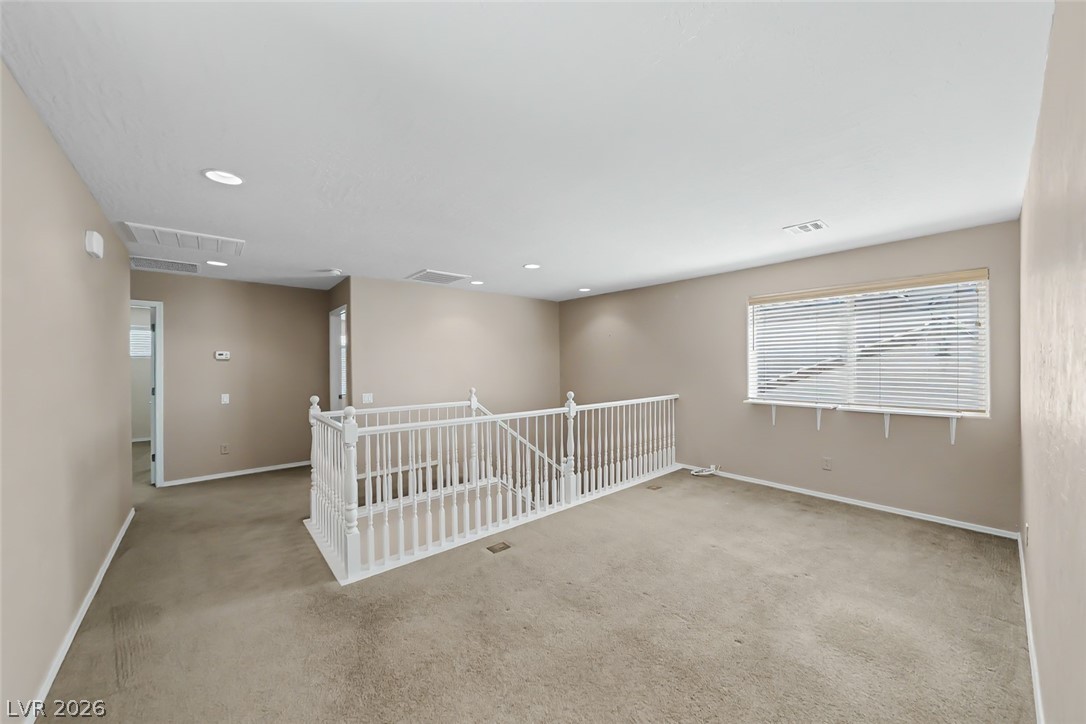 2356 Rue Bienville Way Henderson, NV 89044 - Photo 9 of 20 This versatile loft area offers flexible living space with abundant natural light.