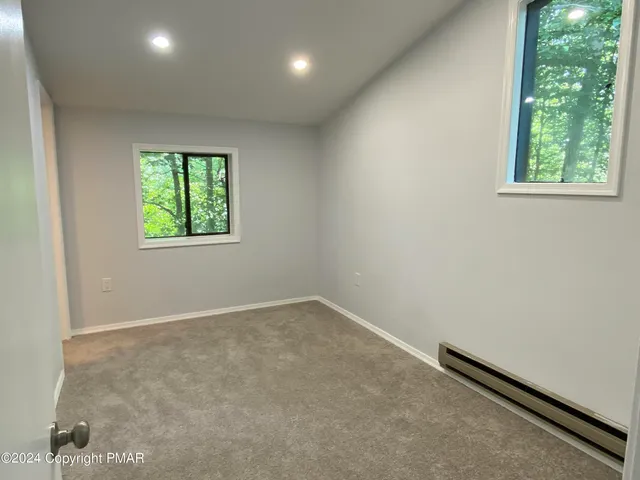 an empty room with windows