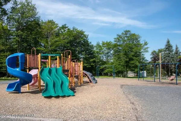 a view of a park with slide