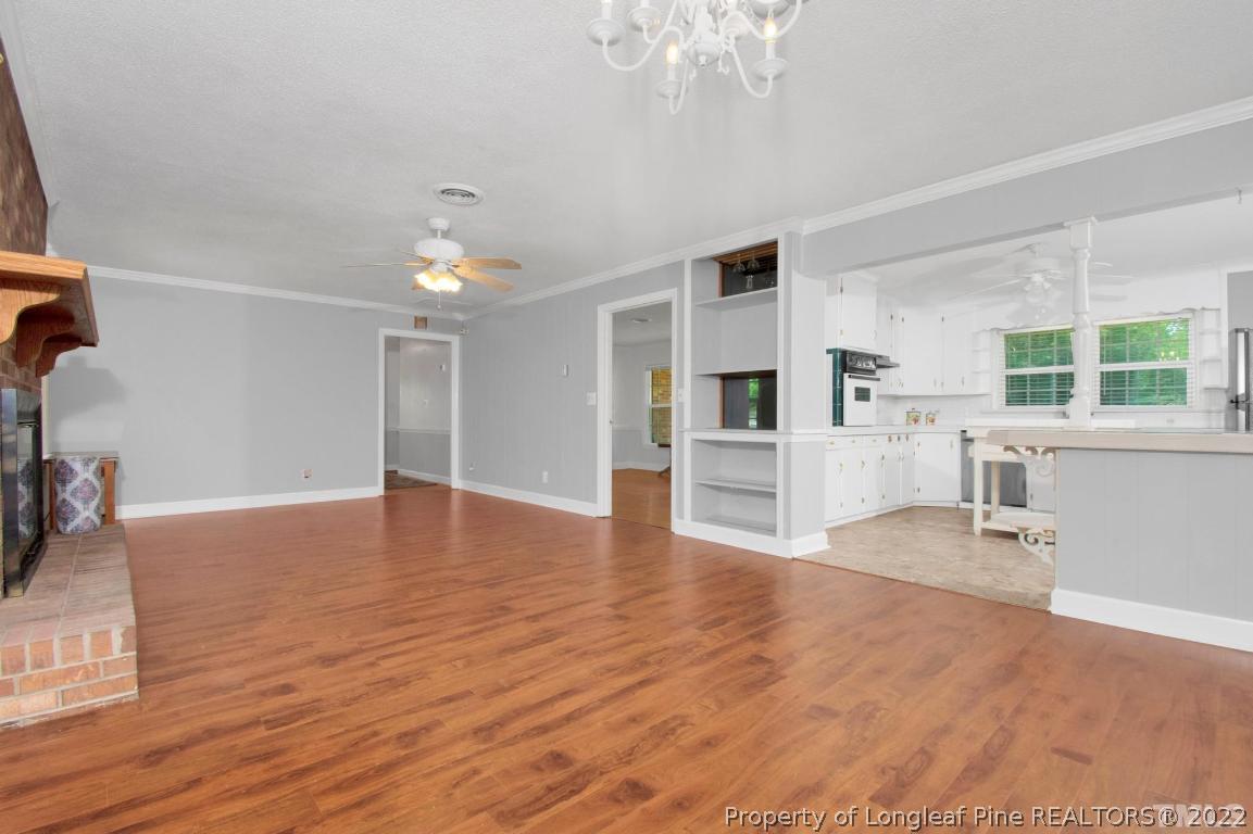 1541 3 Bridge Road Dunn, NC 28334 - Photo 12 of 32 a view of empty room with wooden floor and window