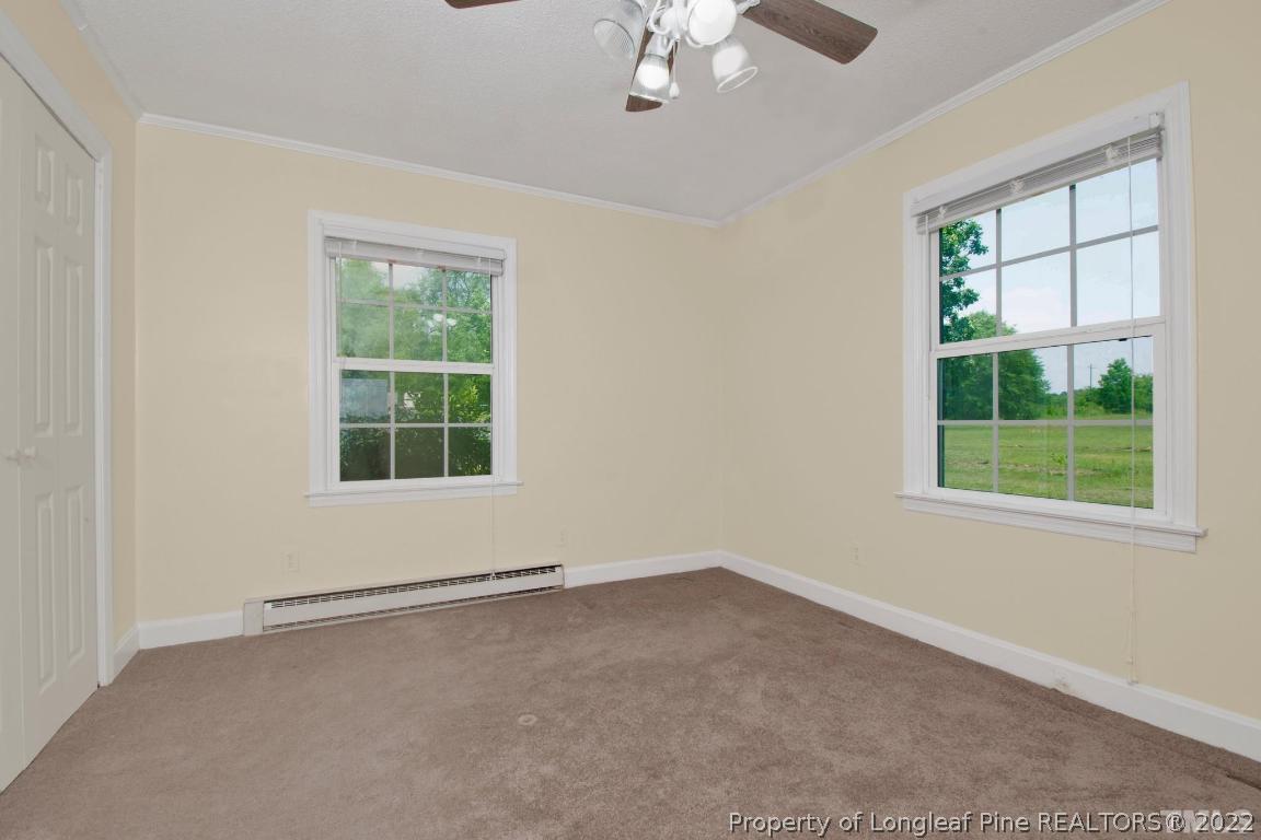 1541 3 Bridge Road Dunn, NC 28334 - Photo 20 of 32 an empty room with a window