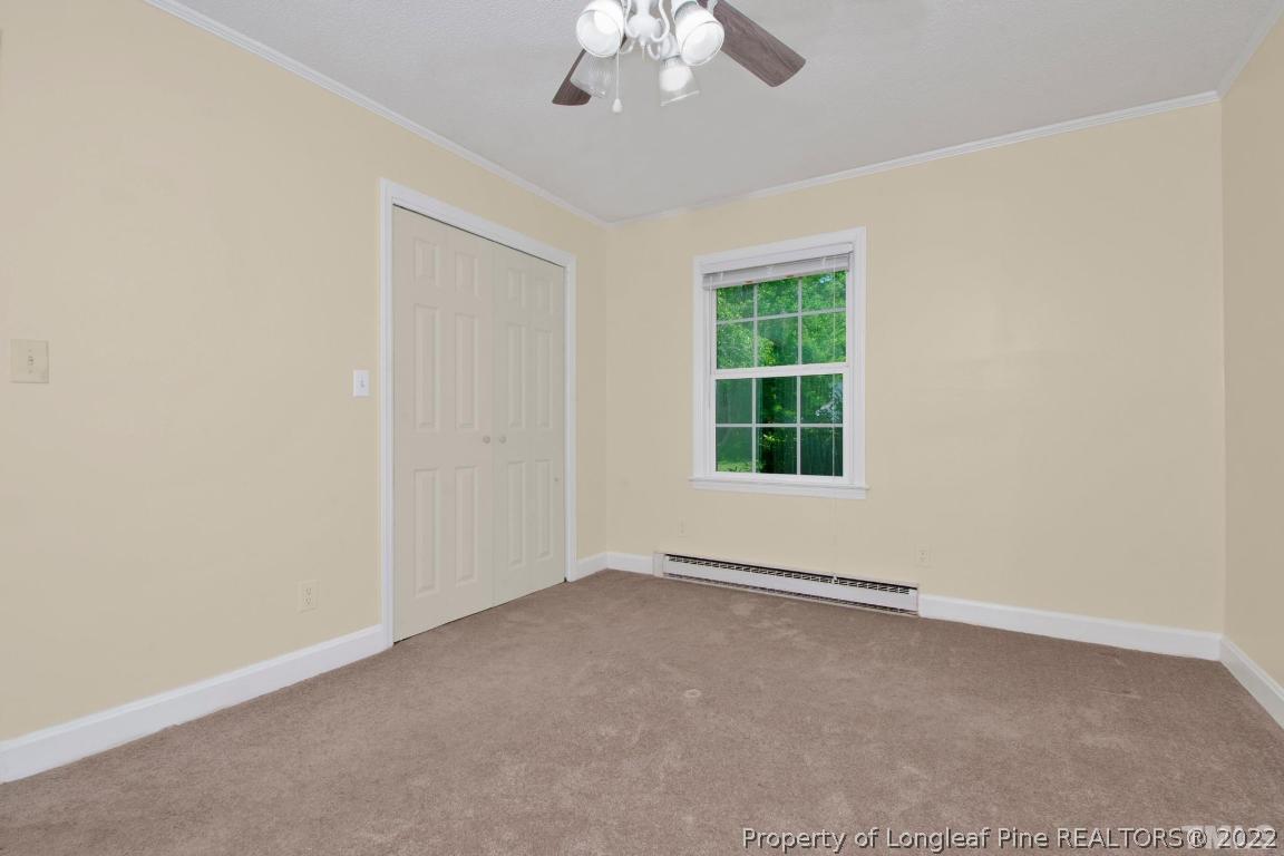1541 3 Bridge Road Dunn, NC 28334 - Photo 21 of 32 an empty room with a window