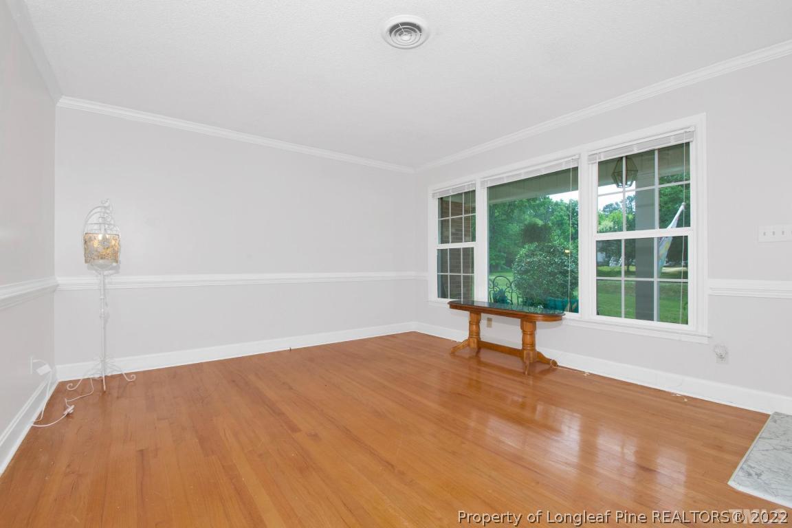 1541 3 Bridge Road Dunn, NC 28334 - Photo 8 of 32 a view of an empty room with a window