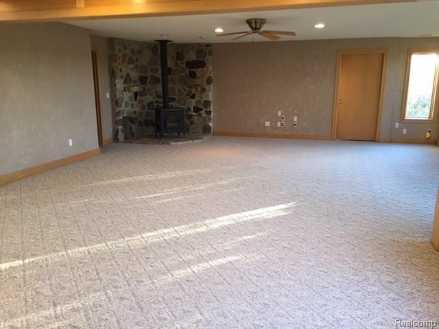 4333 Cedar Lake Road Howell, MI 48843 - Photo 18 of 26 family room with fireplace.JPG