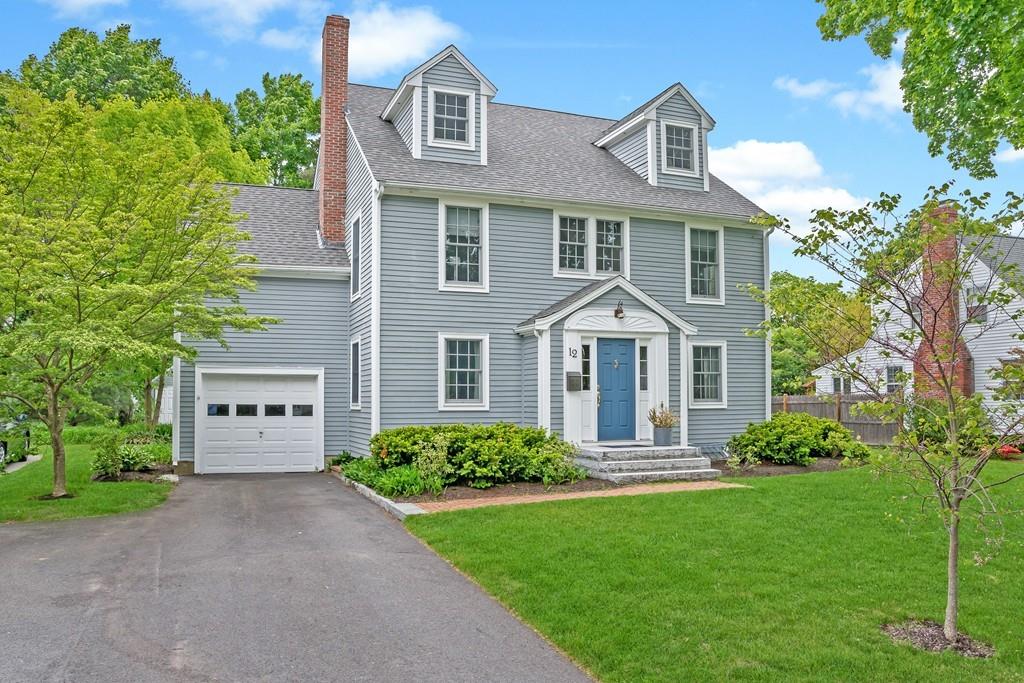 12 Pine Plain Road Wellesley, MA 02481 - Photo 1 of 30 a front view of a house with a yard and garage