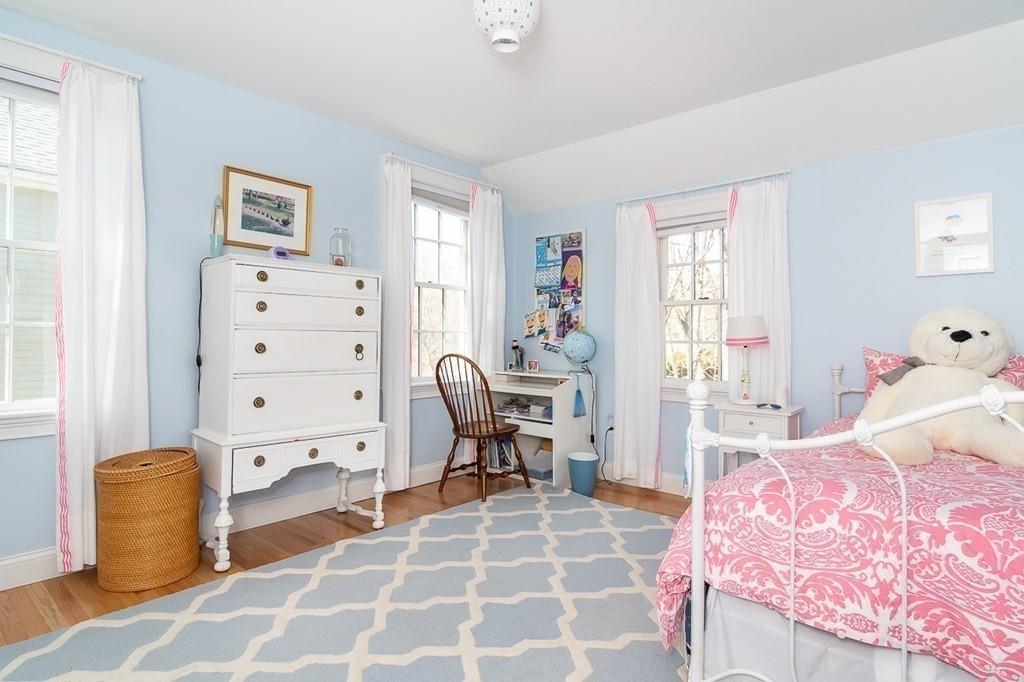12 Pine Plain Road Wellesley, MA 02481 - Photo 16 of 30 a bedroom with a bed and wooden floor