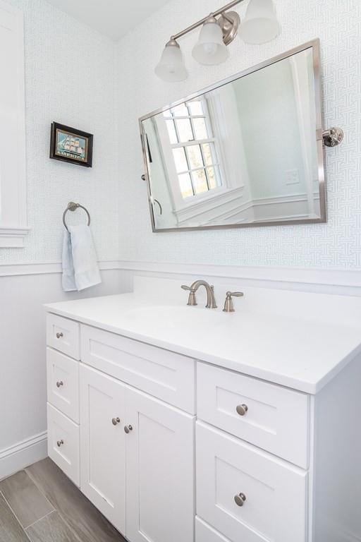 12 Pine Plain Road Wellesley, MA 02481 - Photo 19 of 30 a bathroom with a sink and a mirror