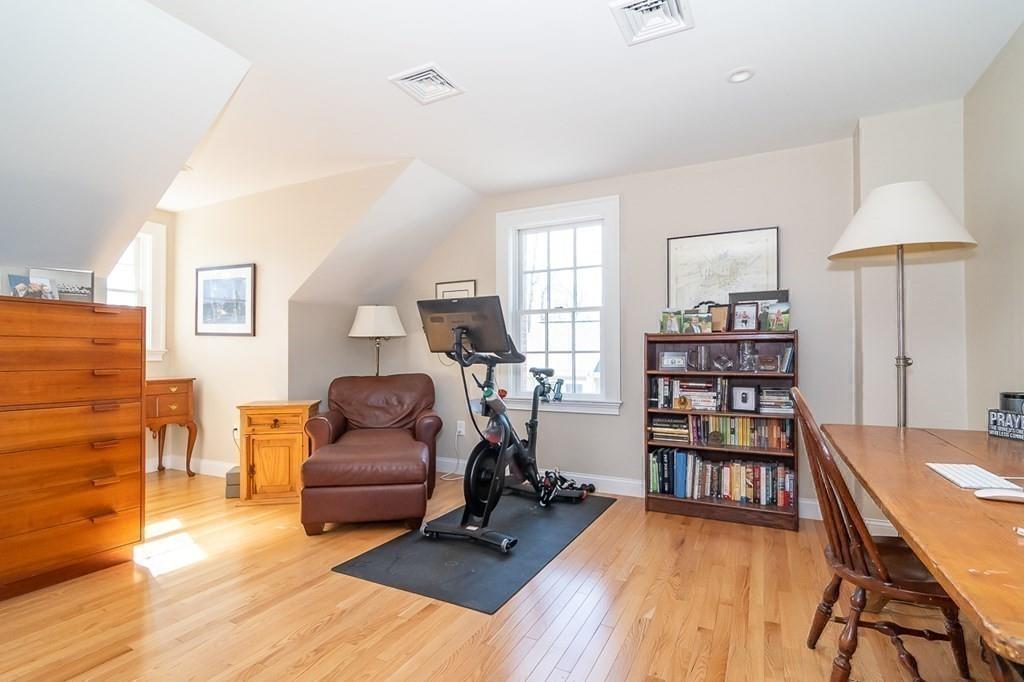 12 Pine Plain Road Wellesley, MA 02481 - Photo 22 of 30 a living room with furniture and a wooden floor