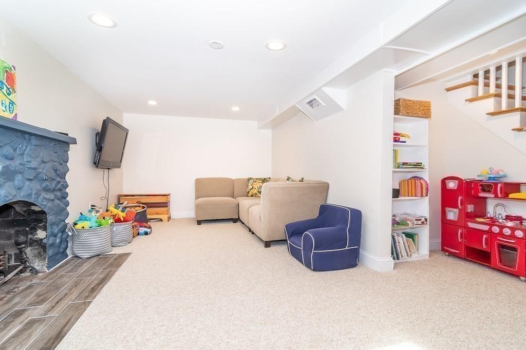 12 Pine Plain Road Wellesley, MA 02481 - Photo 23 of 30 a living room with furniture and a couch