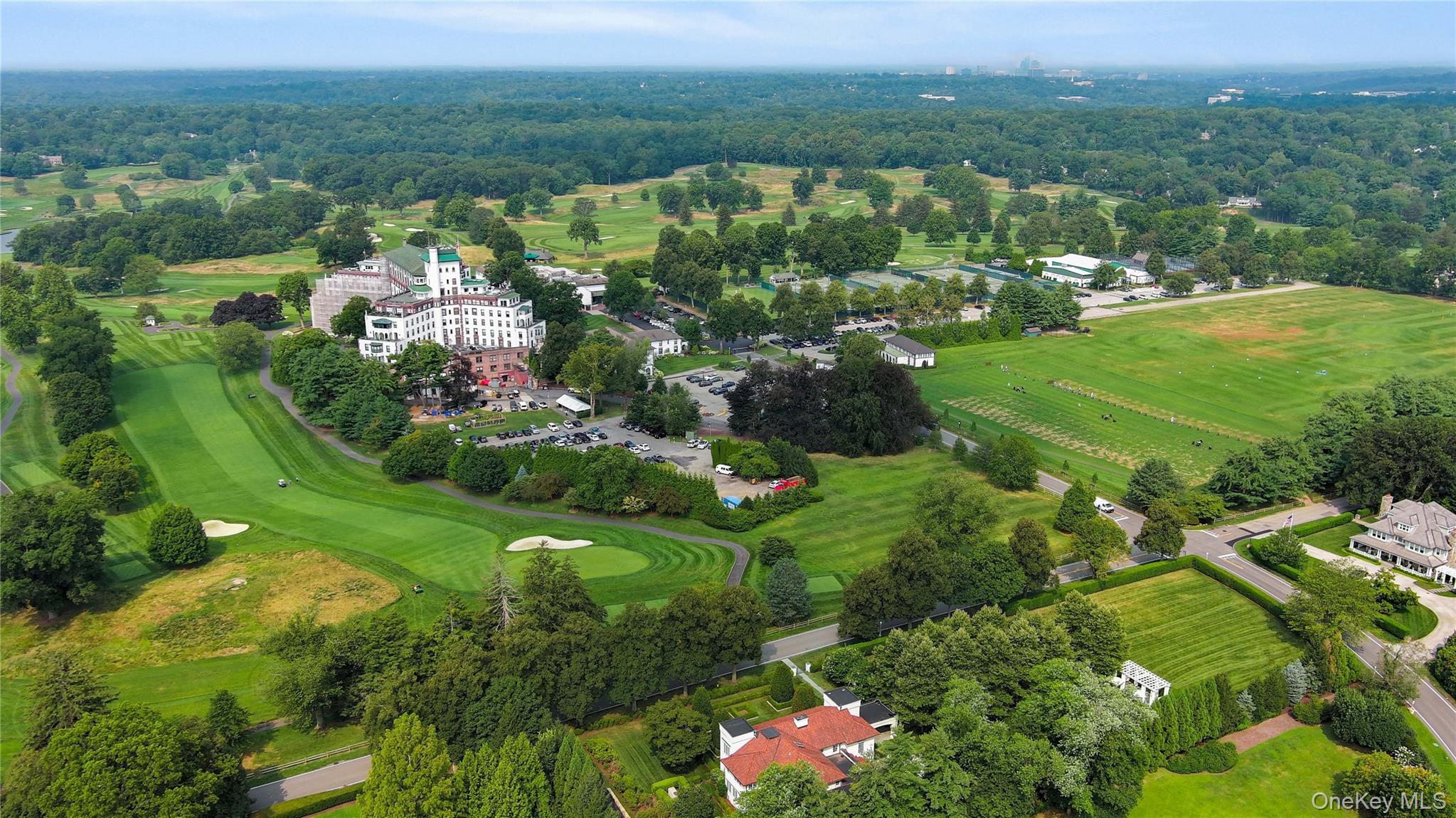 73 Park Drive South Rye, NY 10580 - Photo 1 of 1 a view of a garden with a building in front of it