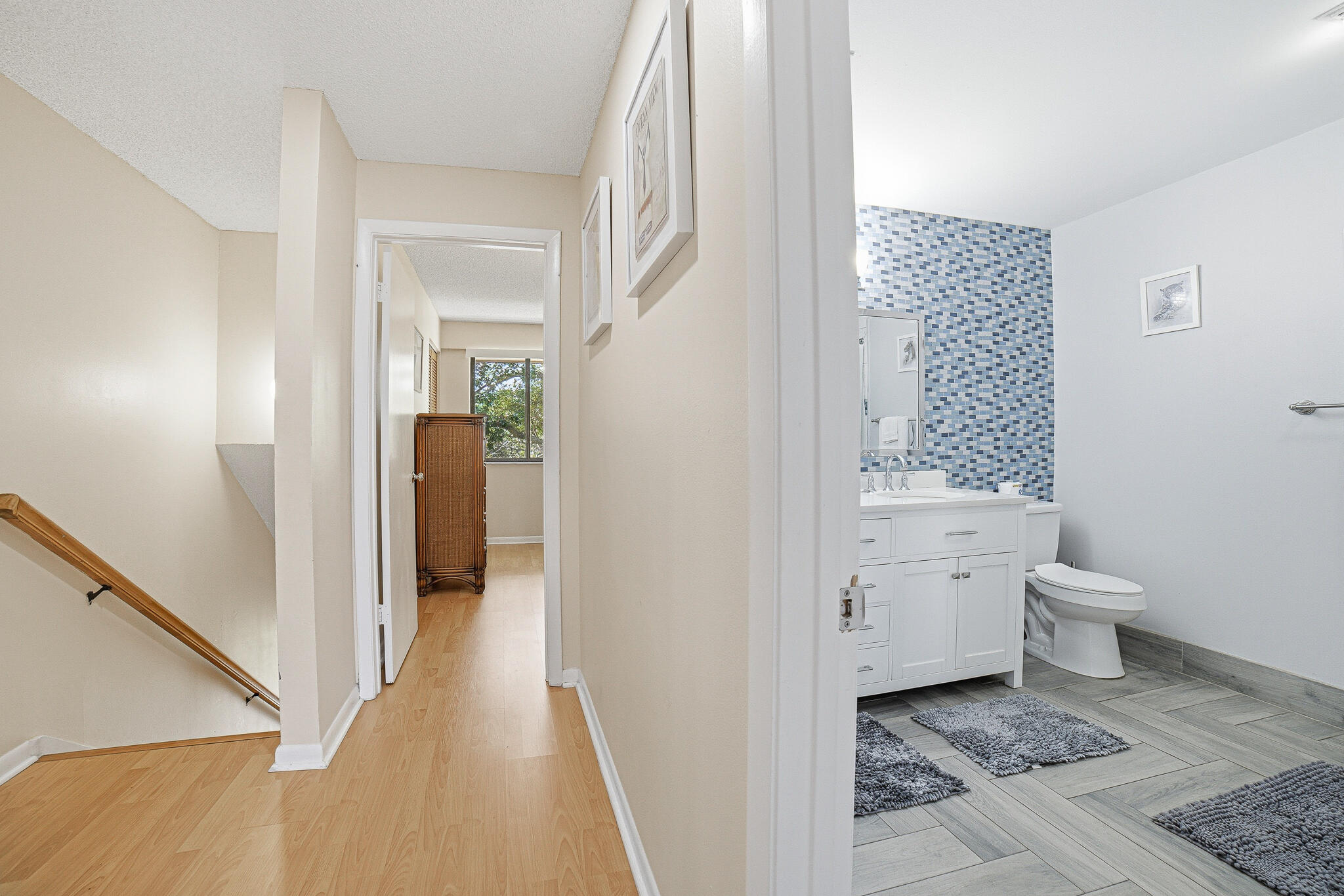 105 Deer Creek Road Deerfield Beach, FL 33442 - Photo 14 of 18 a bathroom with a toilet and a shower