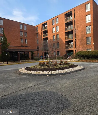 a view of a building with a street
