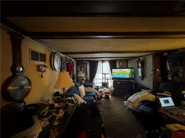 a bathroom with a sink mirror and toilet