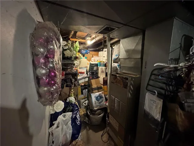 a view of a closet with storage