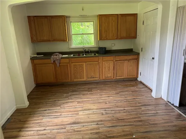 a view of a kitchen with a sink