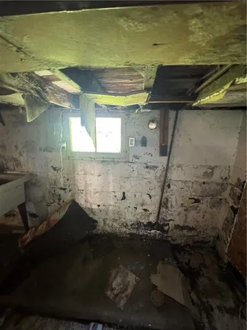 a view of a backyard of the house