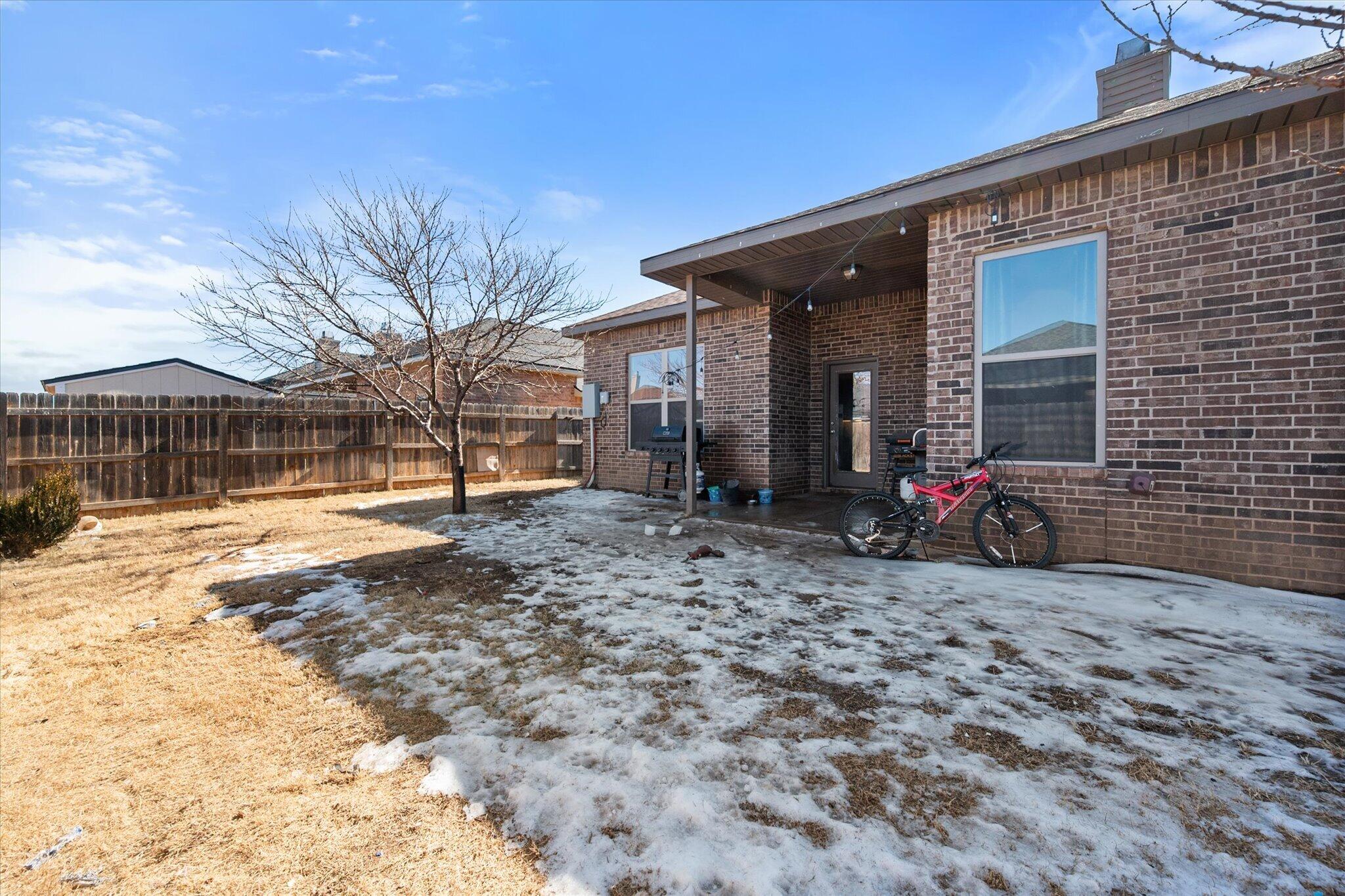 7038 95th Street Lubbock, TX 79424 - Photo 20 of 23 a view of a house with backyard