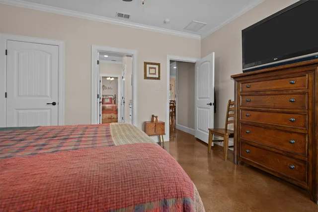 a bedroom with a bed and furniture