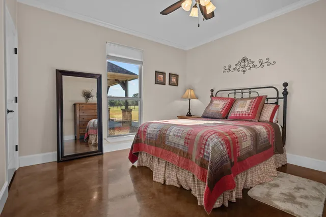 a spacious bedroom with a bed and a walk in closet