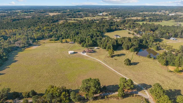 an aerial view of residential house with outdoor space