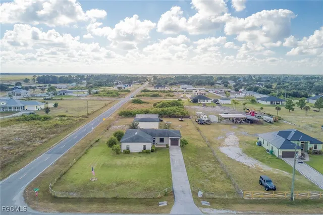 a view of a lake with a yard