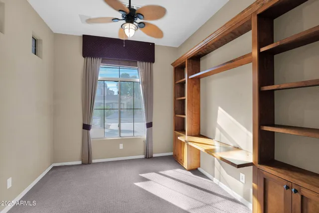 a view of a hallway with bathroom