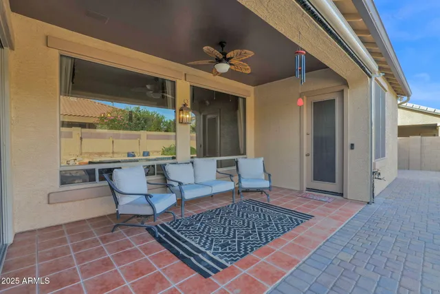 a living room with furniture and a outdoor space