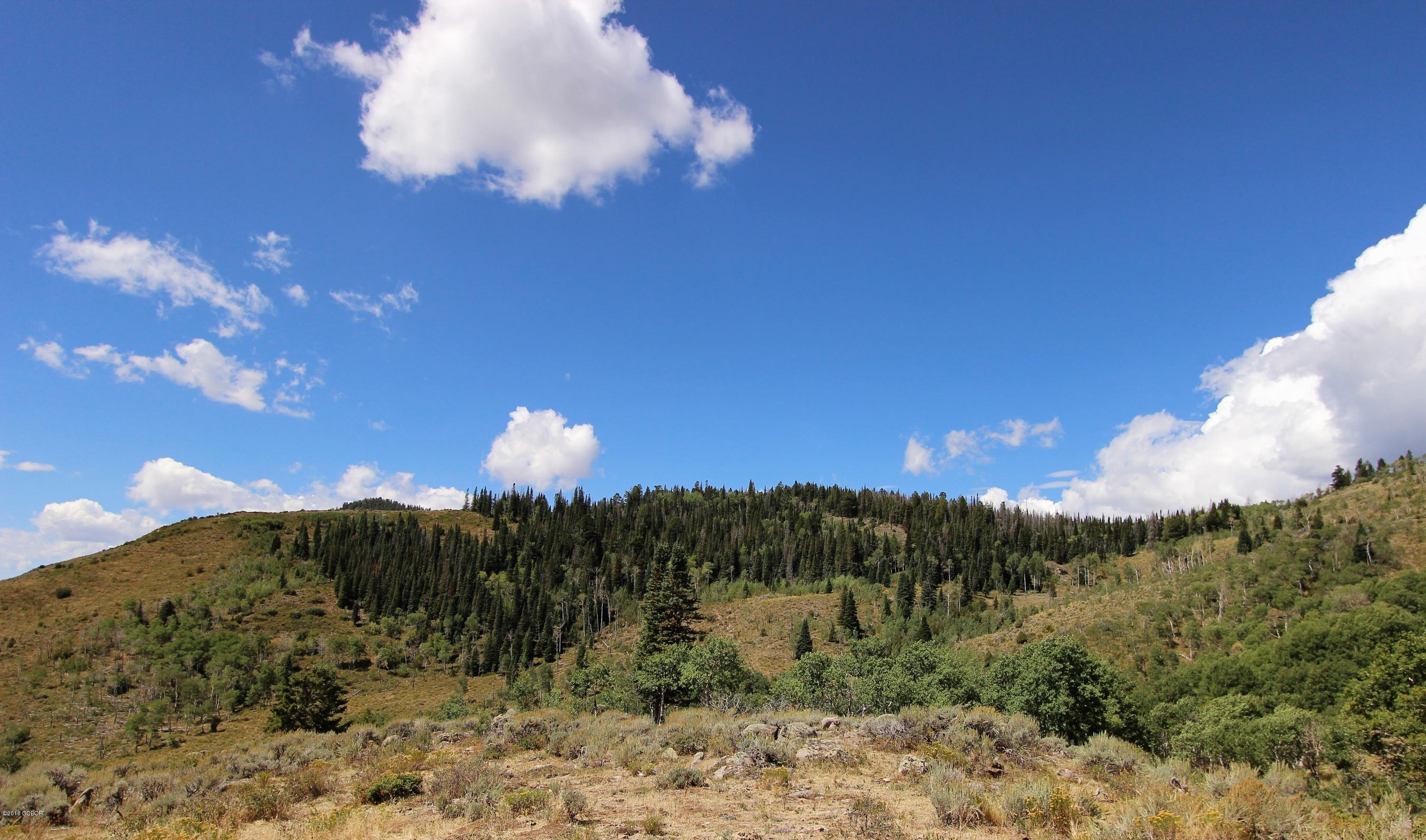 Tbd Copper Spur Road Bond, CO 80423 - Photo 12 of 41 a sunset view with a lake