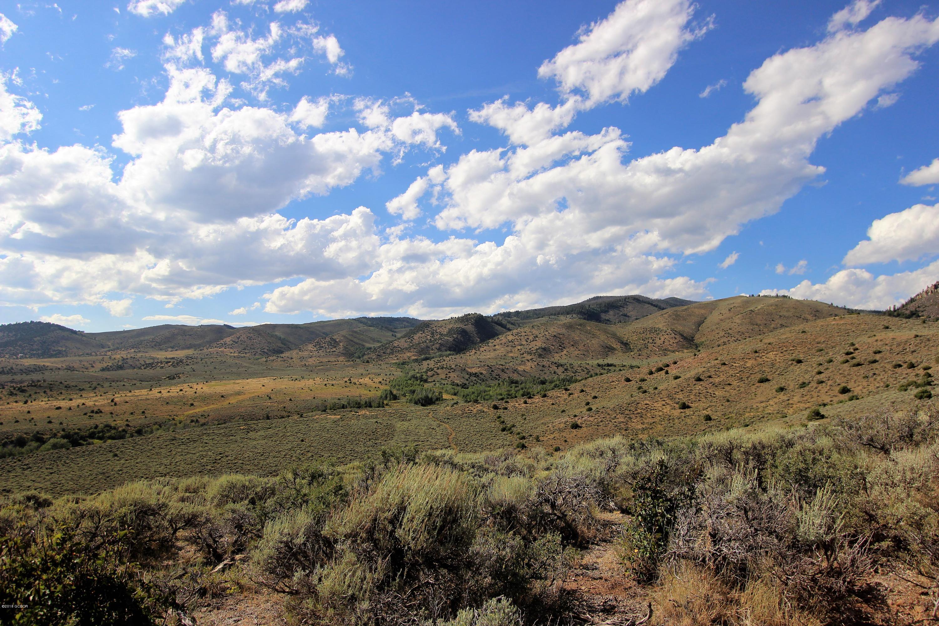 Tbd Copper Spur Road Bond, CO 80423 - Photo 32 of 41 a view of a large mountain with mountains in the background
