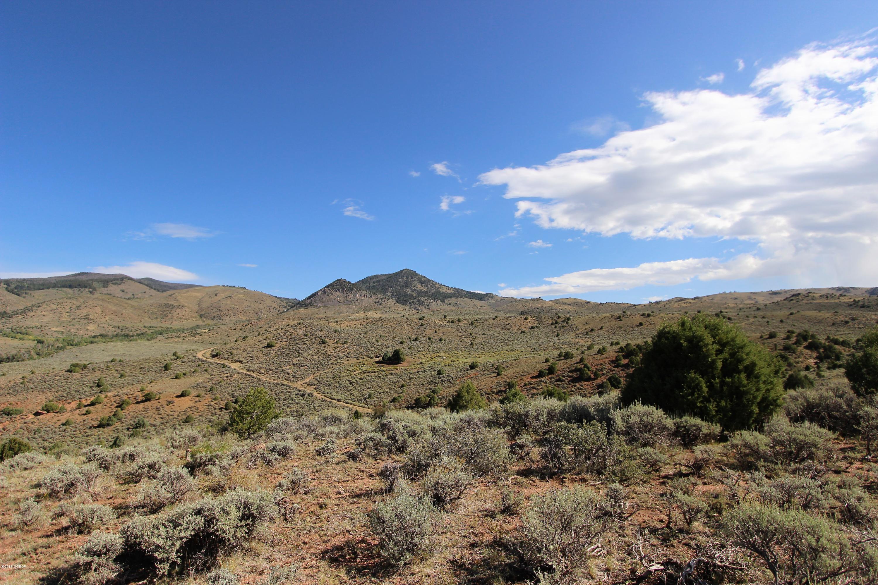 Tbd Copper Spur Road Bond, CO 80423 - Photo 34 of 41 a view of a large mountain with mountains in the background