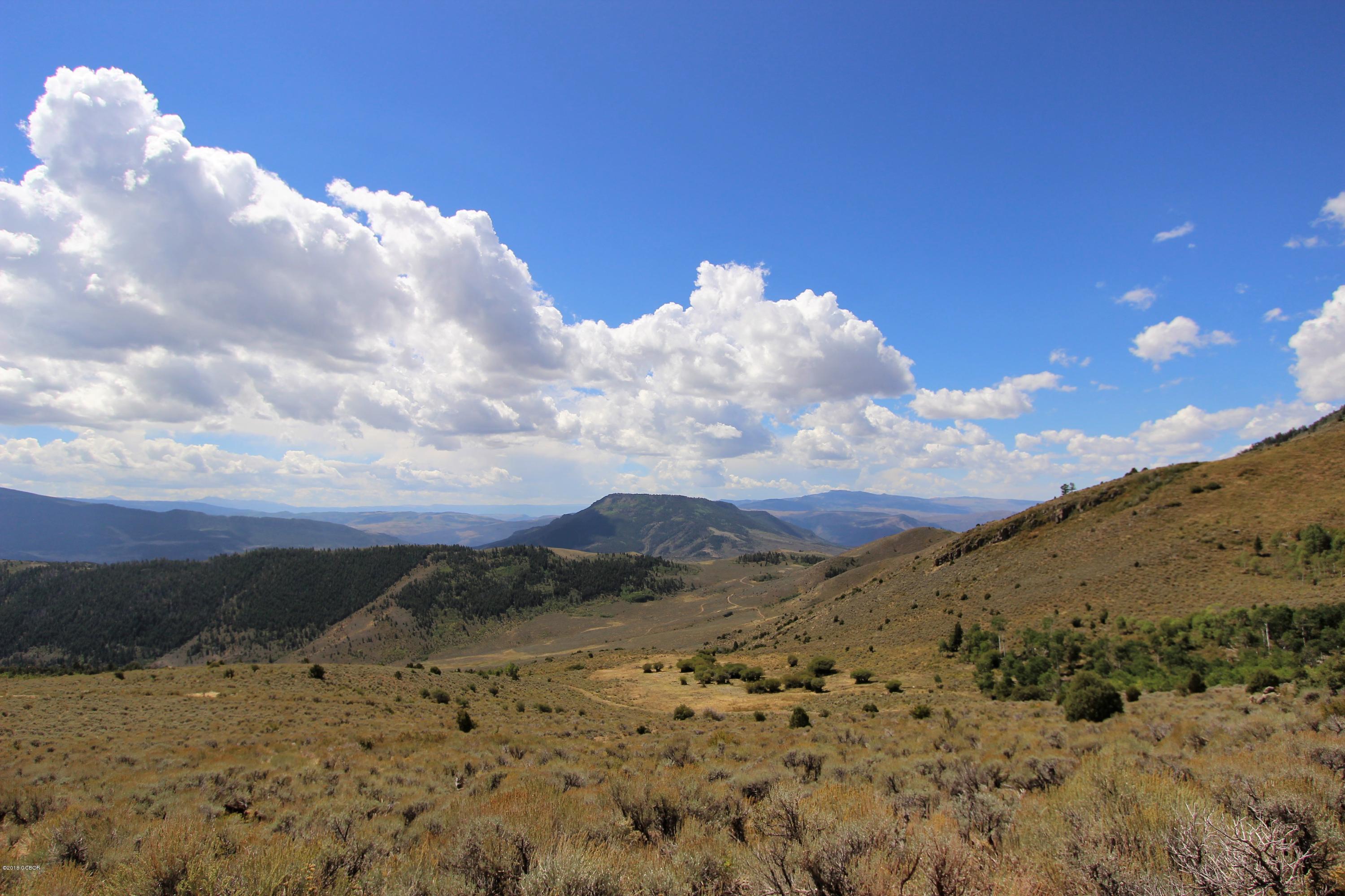 Tbd Copper Spur Road Bond, CO 80423 - Photo 40 of 41 a view of a dry yard with mountains in the background