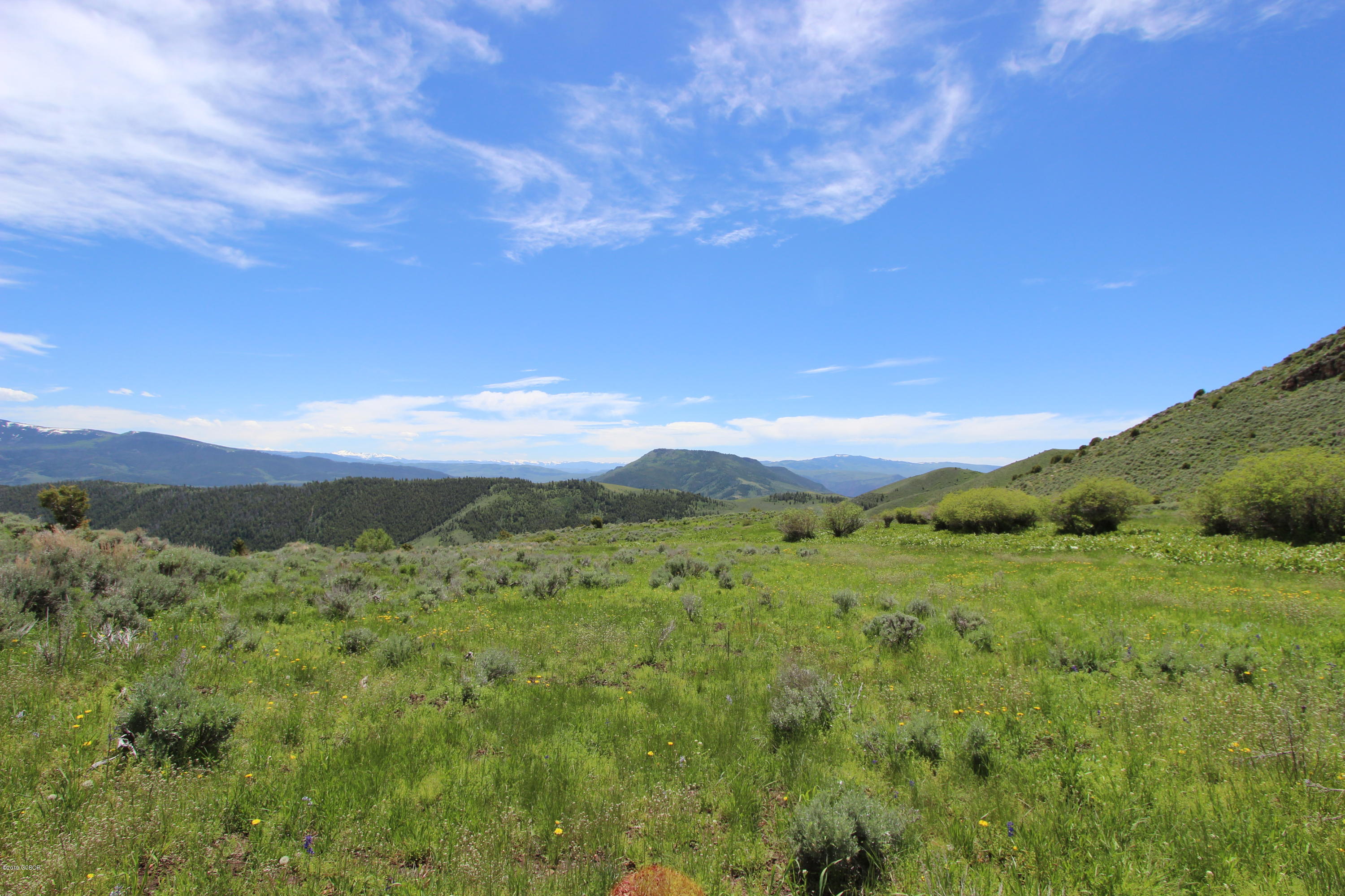 Tbd Copper Spur Road Bond, CO 80423 - Photo 7 of 41 a view of a city with top of mountains in the background